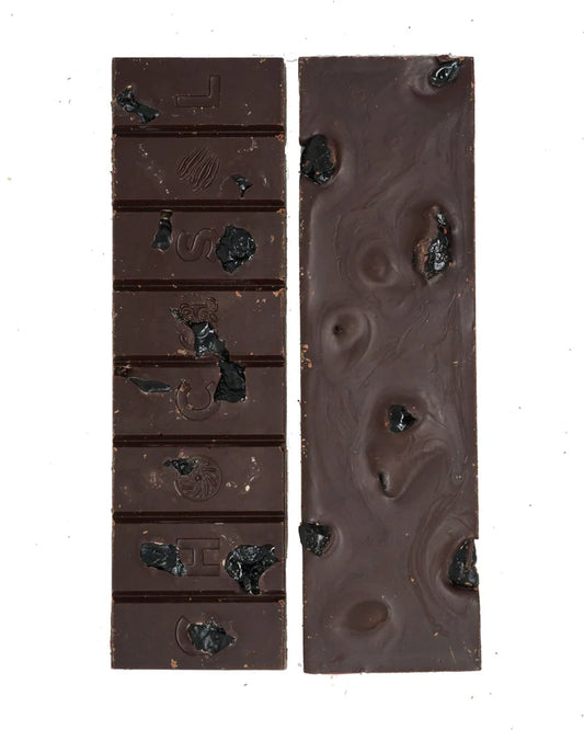 Two chocolate bars with visible dark chocolate pieces on a white background