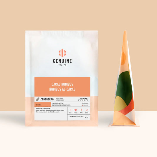 Genuine Tea Co. Cacao Rooibos tea package on a beige background