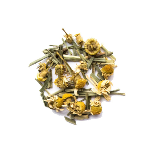 Herbal tea mix with chamomile and lemon balm on a white background