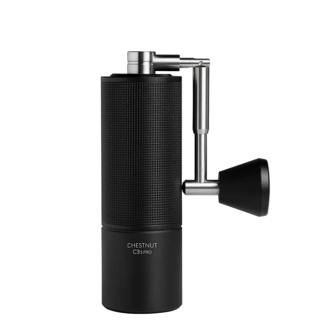 Black manual coffee grinder with metallic handle on a white background
