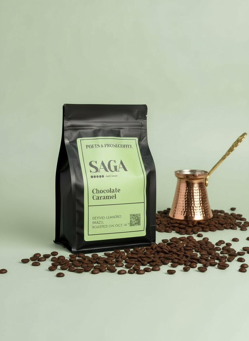 Coffee bag labeled 'SAGA Chocolate Caramel' with coffee beans and caramels on a light green background