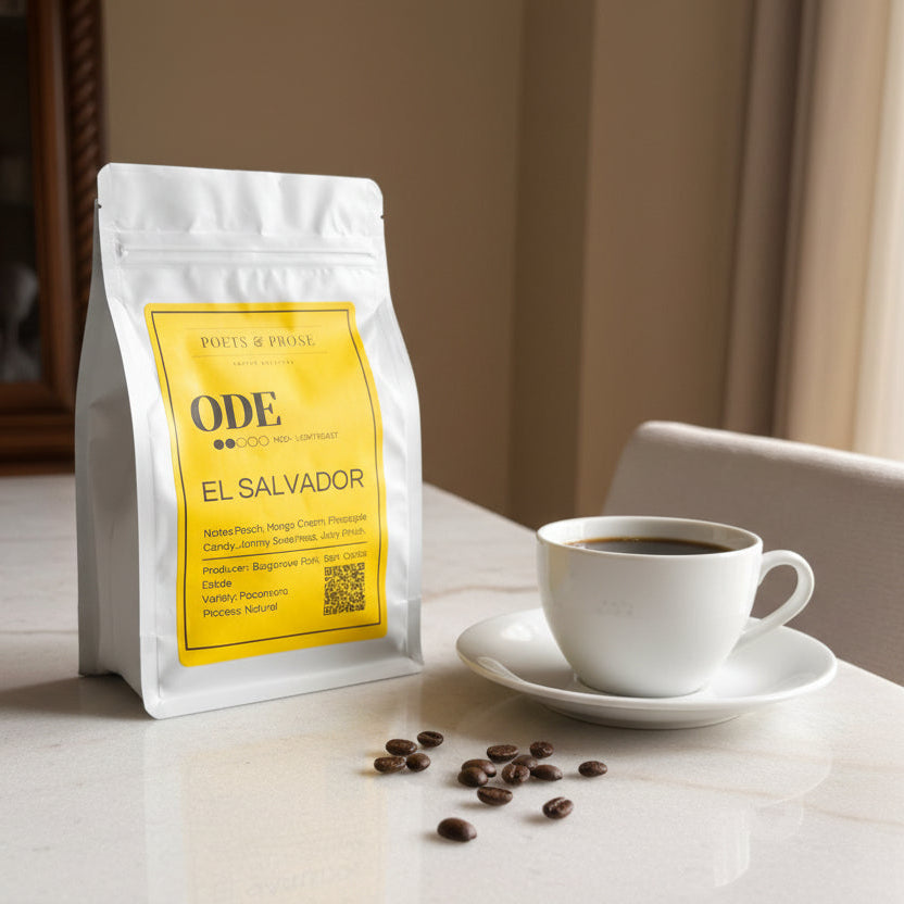 Coffee package labeled 'ODE El Salvador' by Poets & Prose on a light surface.