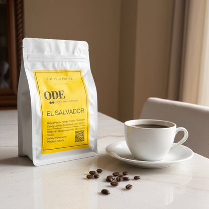 Coffee package labeled 'ODE El Salvador' by Poets & Prose on a light surface.