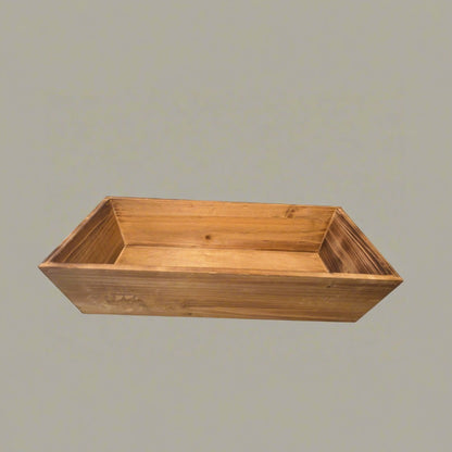 Wooden planter box on a gray background